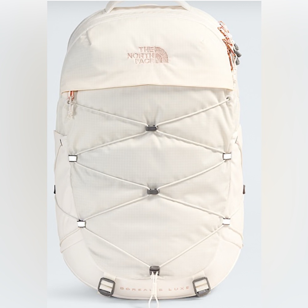 The North Face Cream Backpack with Bungee Cords